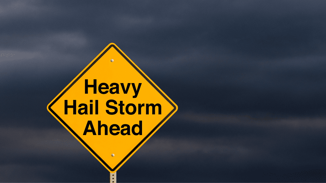 Yellow warning sign: heavy hail storm ahead