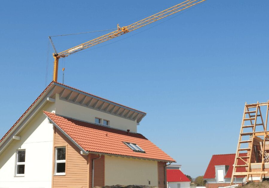 Residential roof construction with tower crane